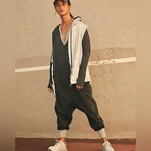 Free People Movement Hot Shot Long Sleeve Onesie 
Like new 
Color - Washed black